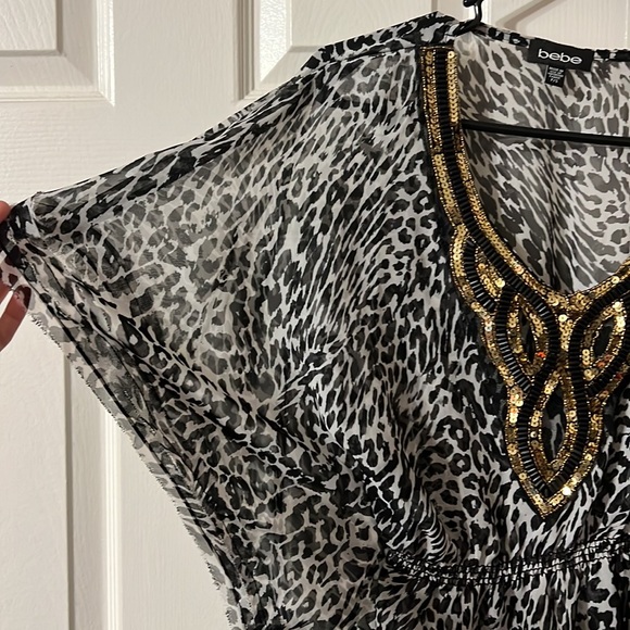 Ladies size Small Bebe top. - Picture 4 of 5